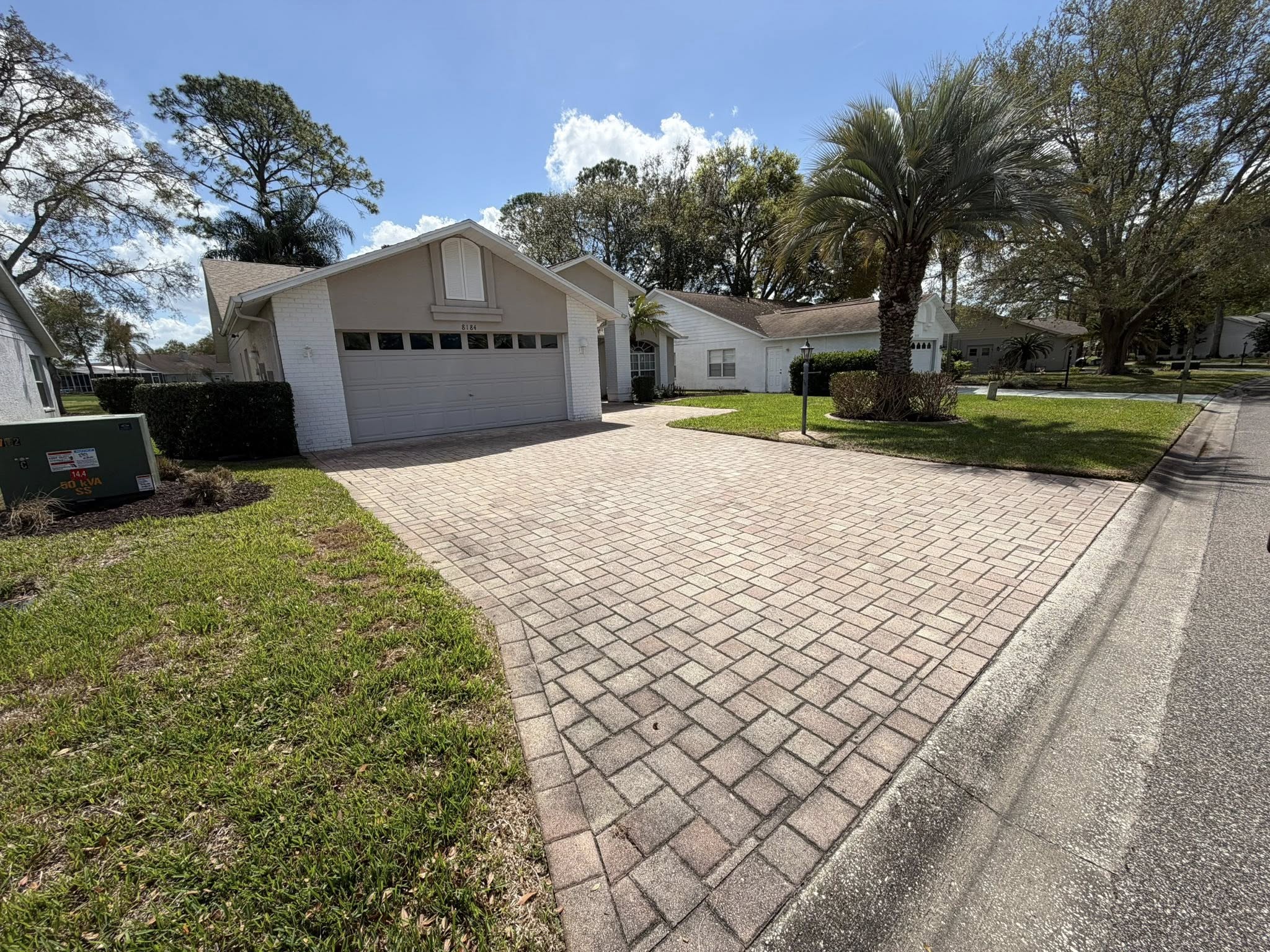 Dirty driveway before cleaning